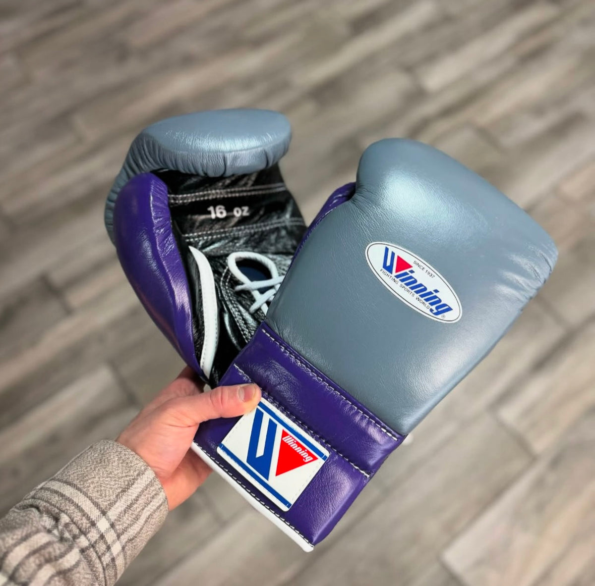 Winning Boxing Gloves Grey/Purple/Black on Hands Training Gloves Close Up
