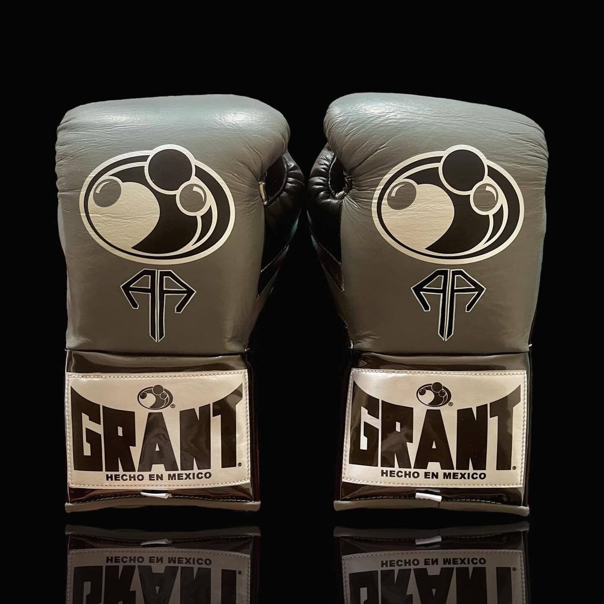Grant Boxing Gloves Grey/Gold on Hands Training Action Shot Back View