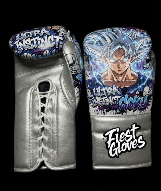 Premium boxing gloves with Ultra Instinct Goku inspired graffiti artwork in silver and blue street art style.