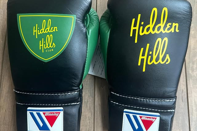 Winning Black/Green/Yellow Leather Boxing Gloves Close View
